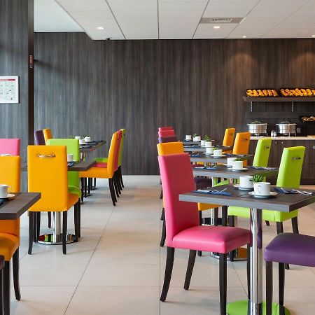 Hotel Roi Soleil Prestige Plaisir - St Quentin Esterno foto