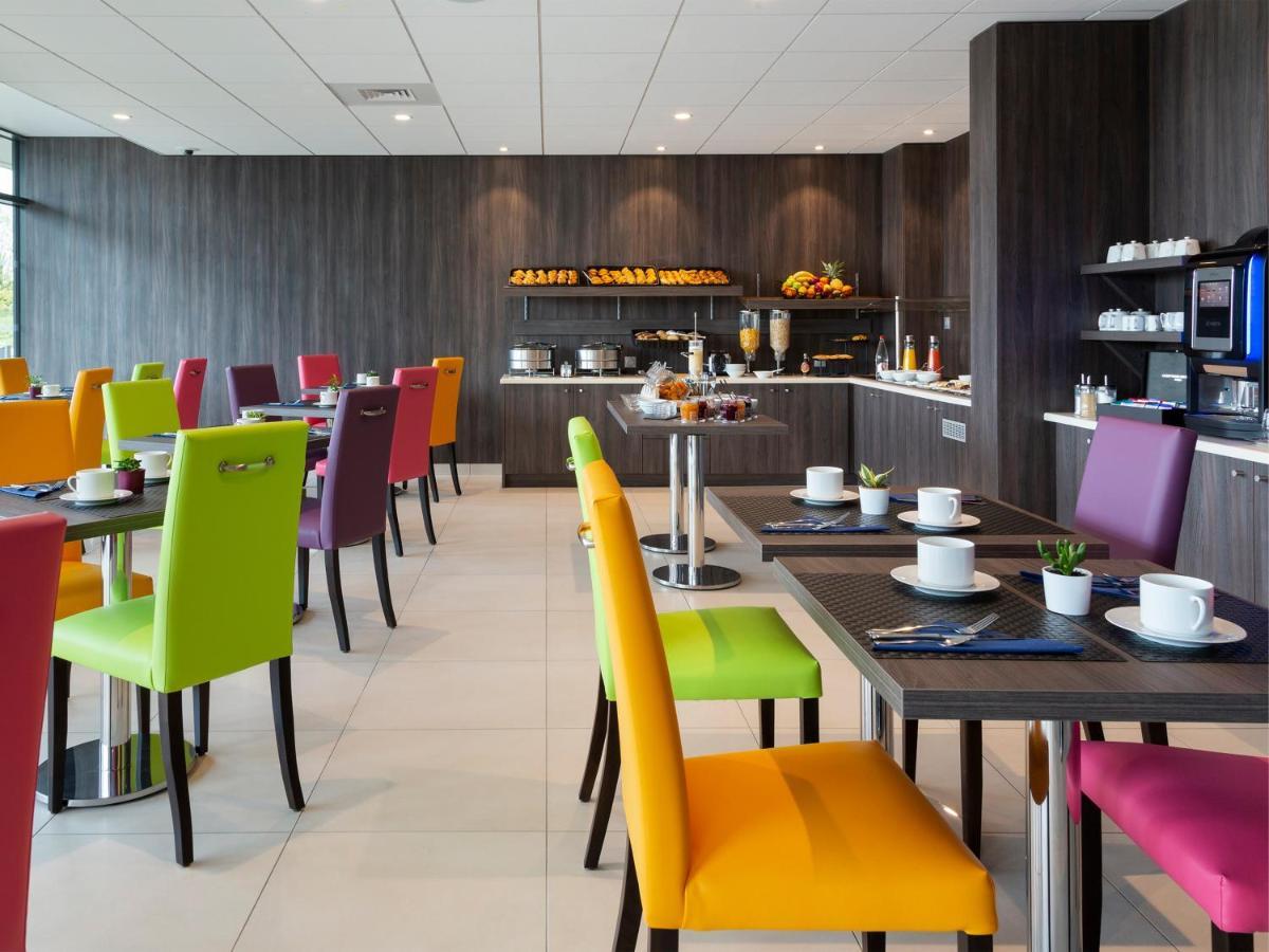 Hotel Roi Soleil Prestige Plaisir - St Quentin Esterno foto