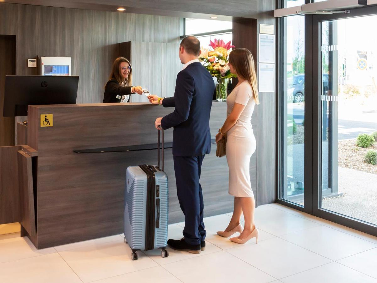 Hotel Roi Soleil Prestige Plaisir - St Quentin Esterno foto