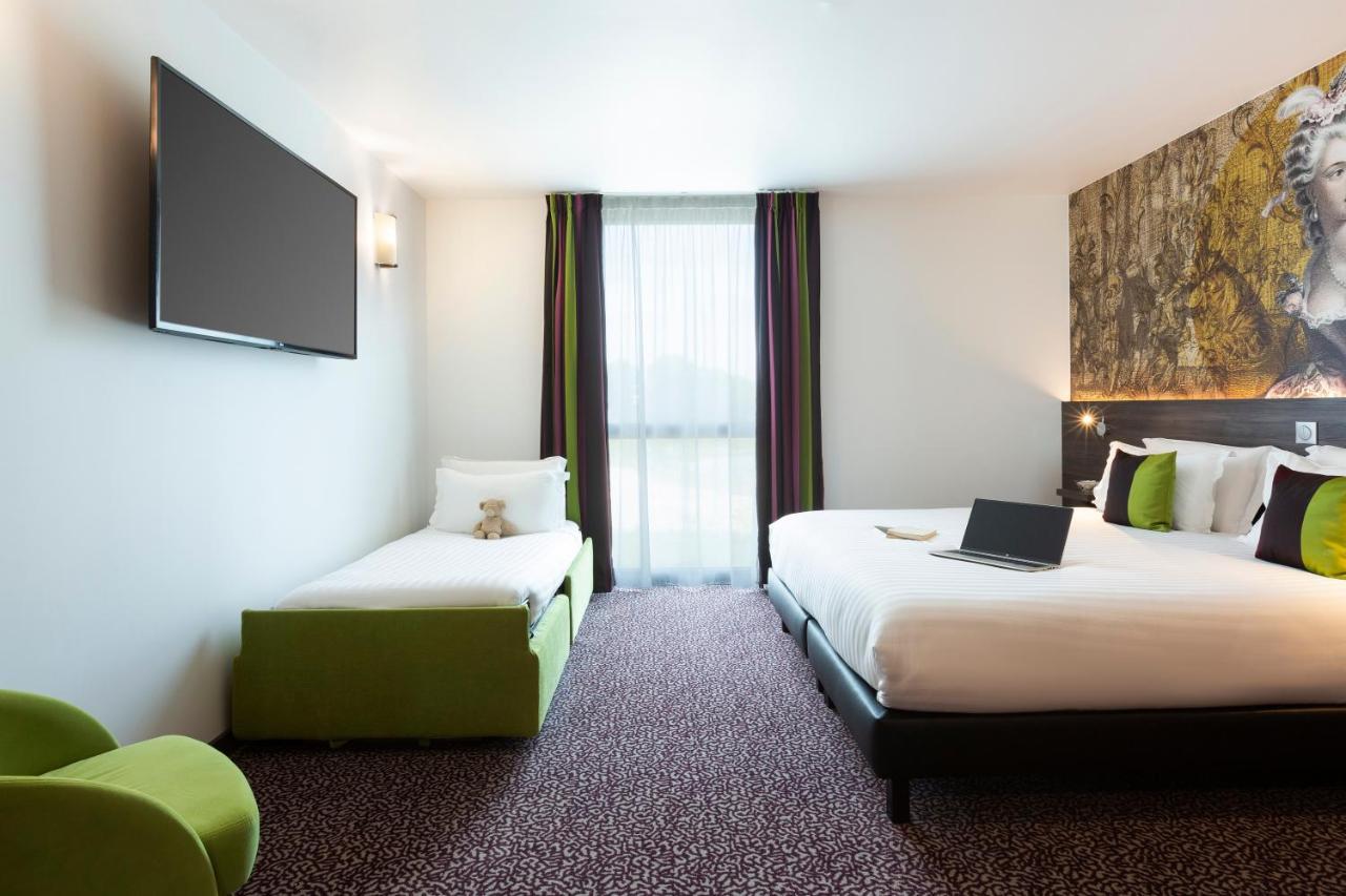 Hotel Roi Soleil Prestige Plaisir - St Quentin Esterno foto