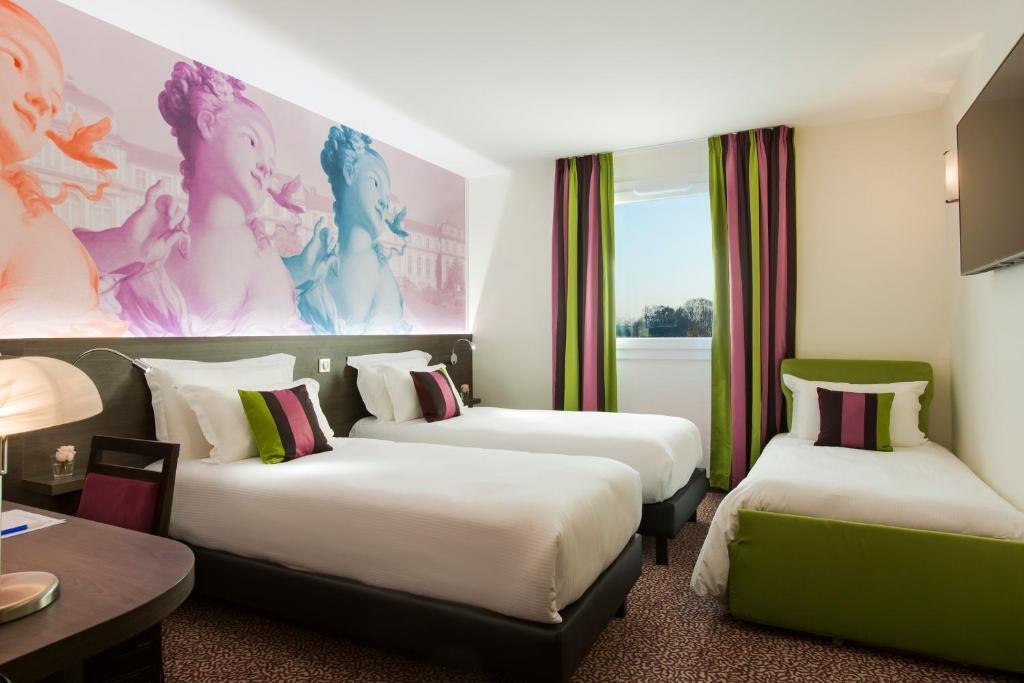 Hotel Roi Soleil Prestige Plaisir - St Quentin Esterno foto